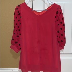 pink top w/ black polka dot sleeves and underlayer